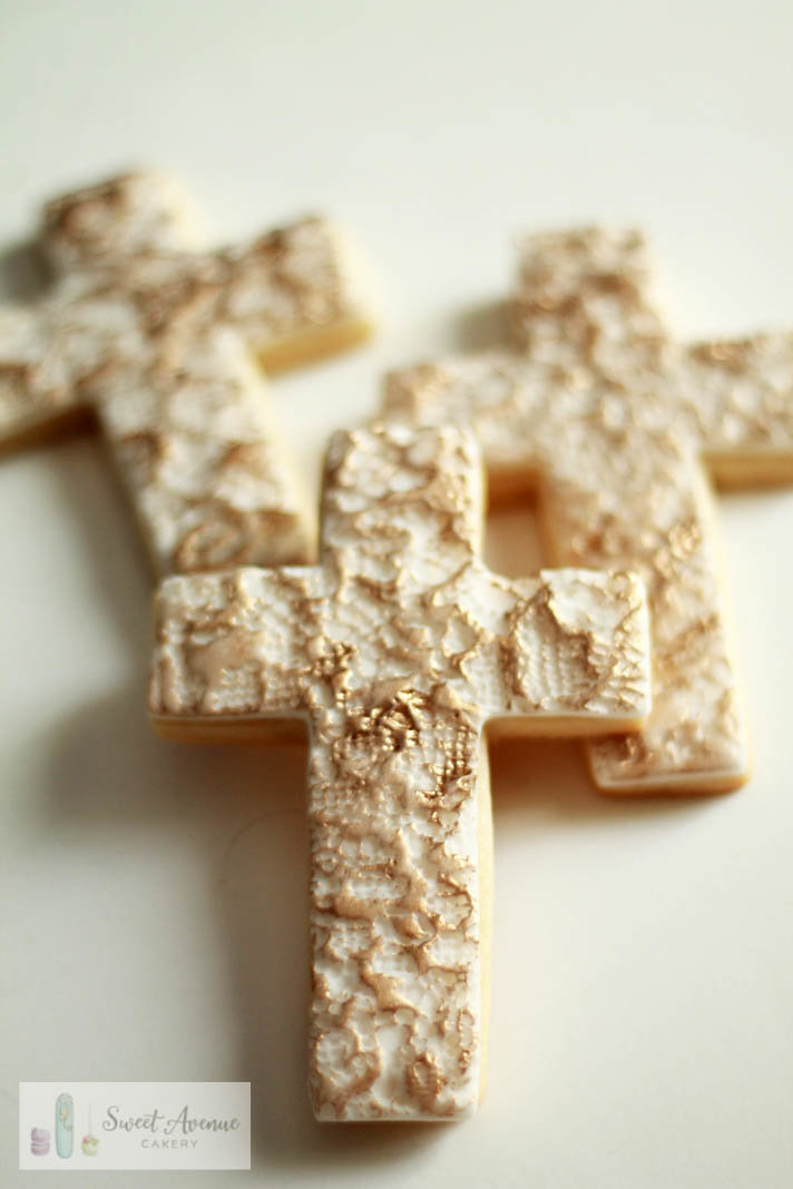 white and gold cross sugar cookies