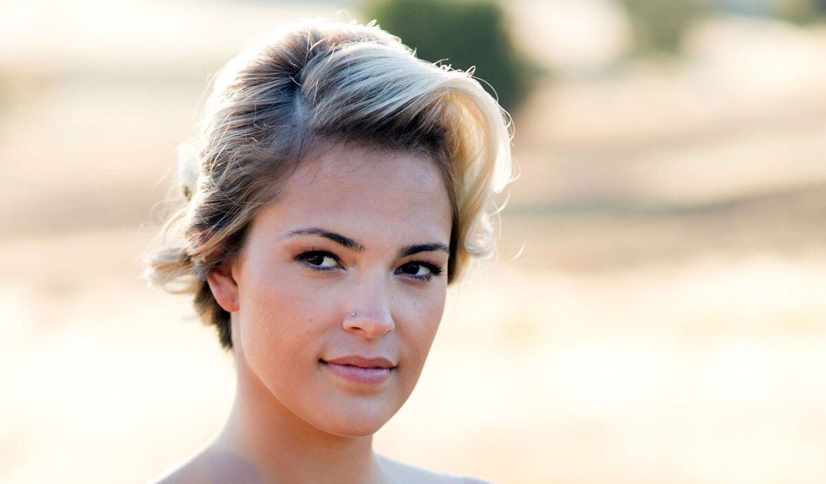 blonde bride with bronze tonal classic bridal makeup with updo