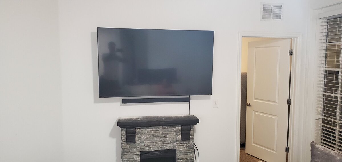 Mounted TV over fireplace
