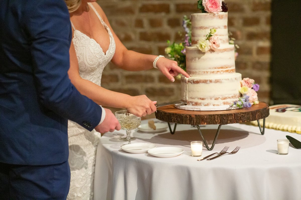 cutting of cake at wedding reception