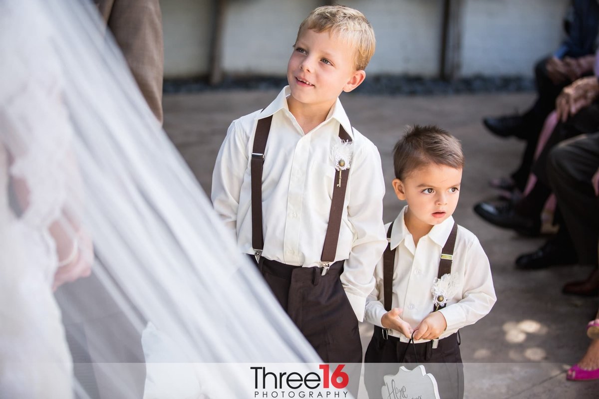 Young boys serve as Groomsmen at the wedding