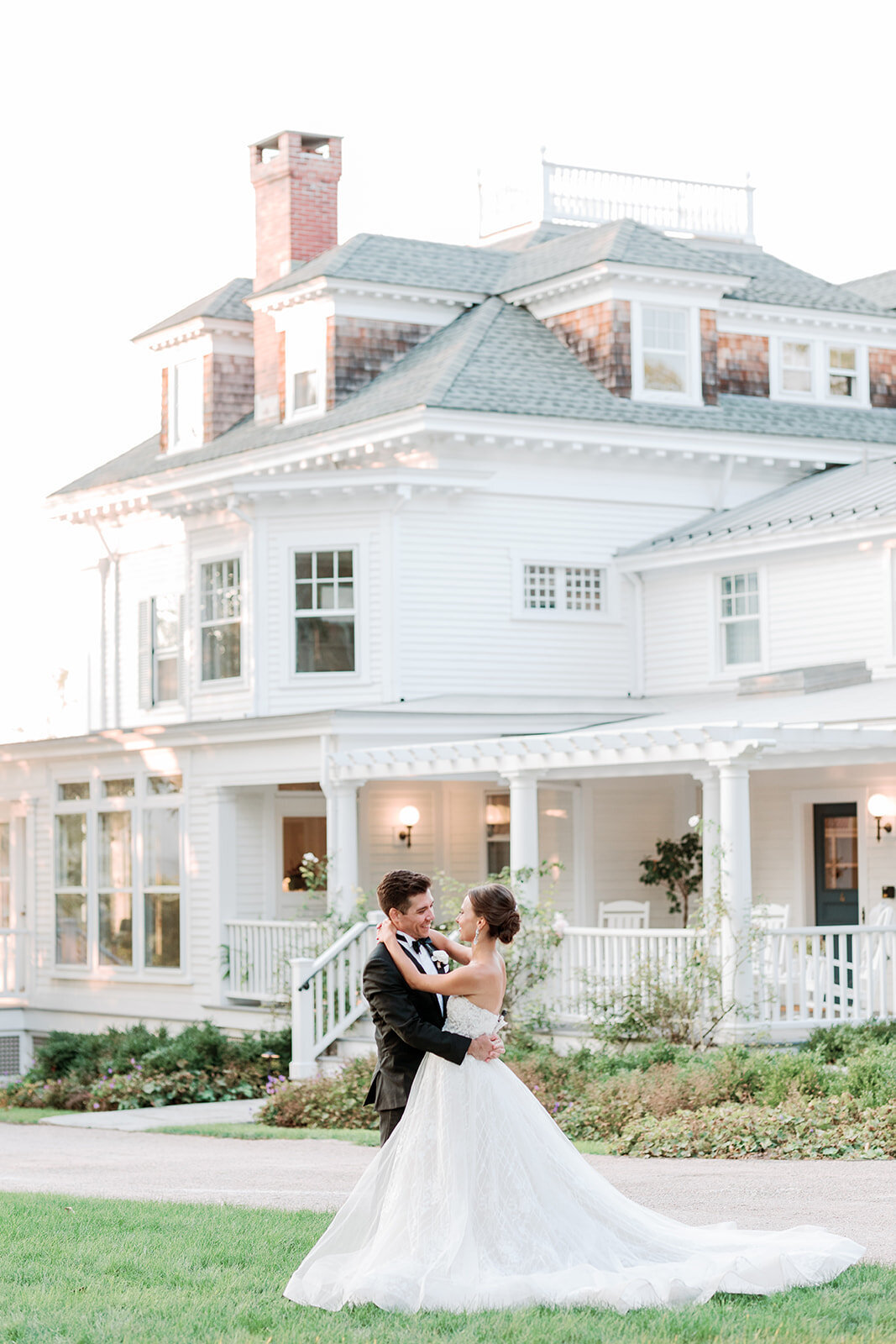 Couple embrace outside of Connecticut estate wedding venue