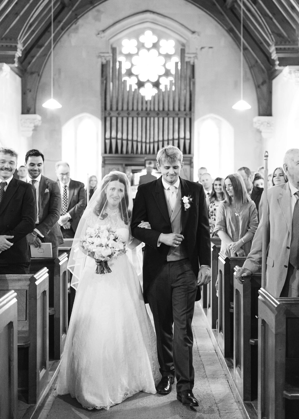 chloe-winstanley-weddings-wiltshire-bride-church-entrance