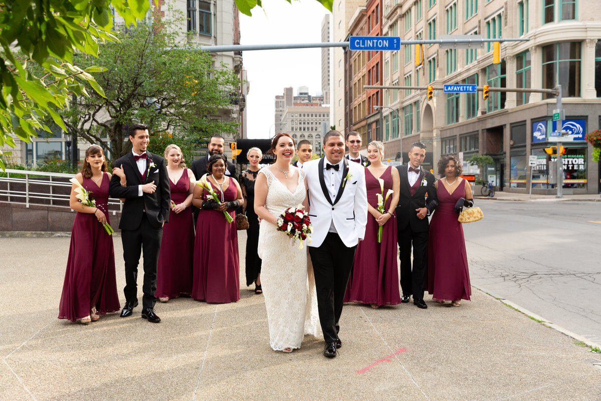bride and groom with their wedding party  in downtown Buffalo NY