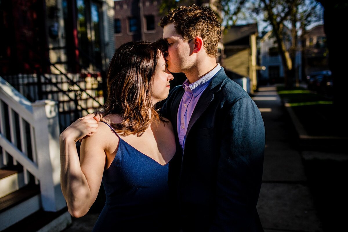 A couple hugs during a Roscoe Village engagement session.