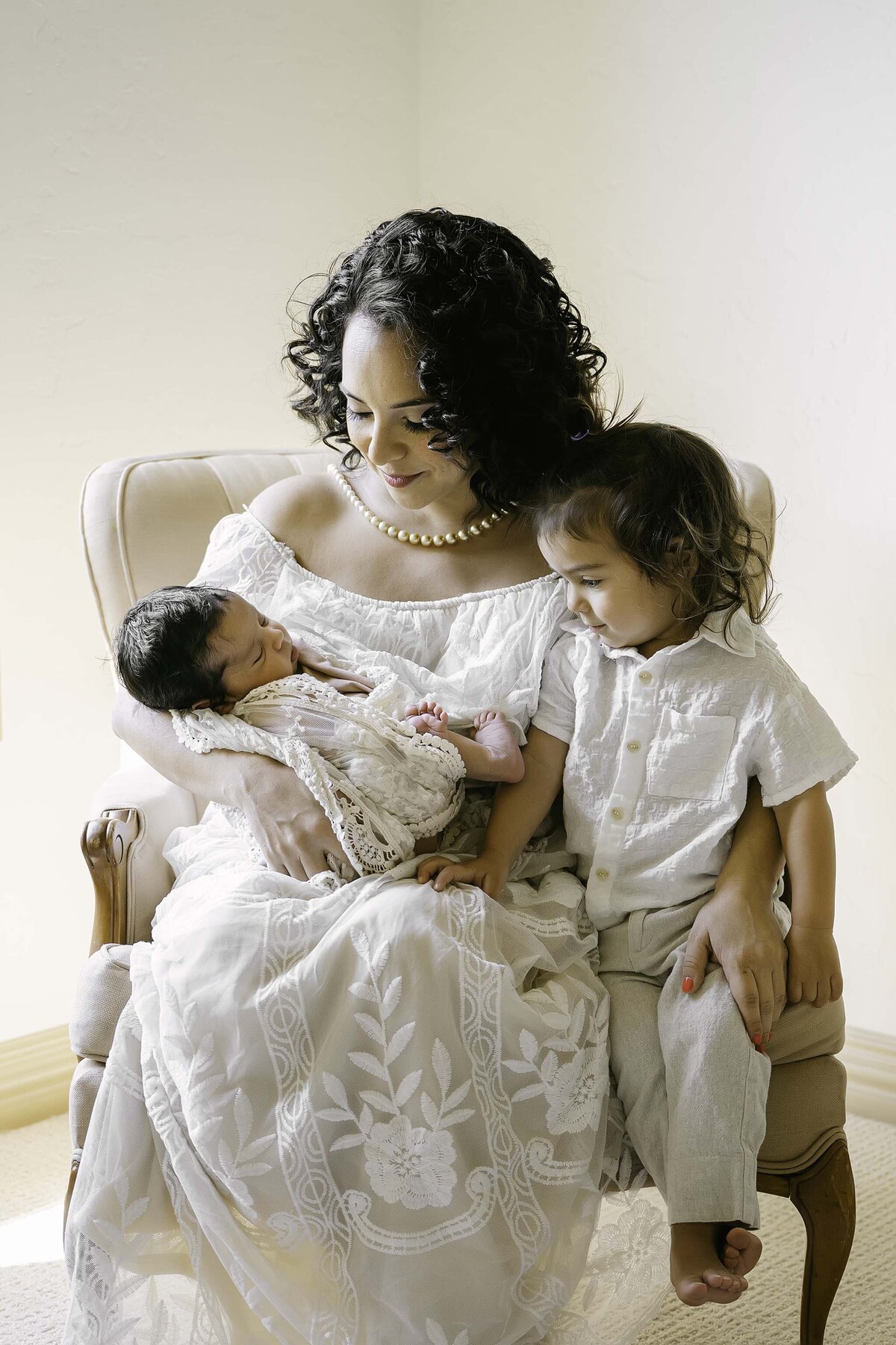 Mom and her babies at home - newborn lifestyle session