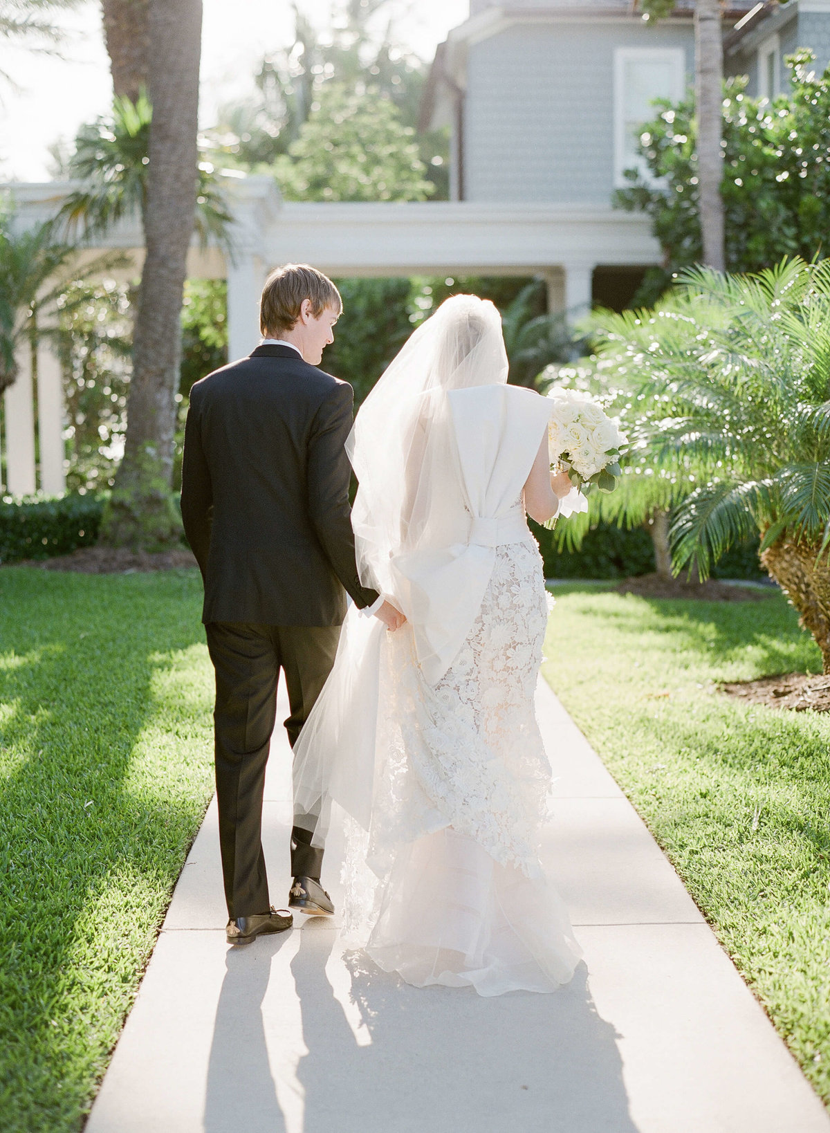 26-KTMerry-weddings-bride-groom-leaving-church-Palm-Beach