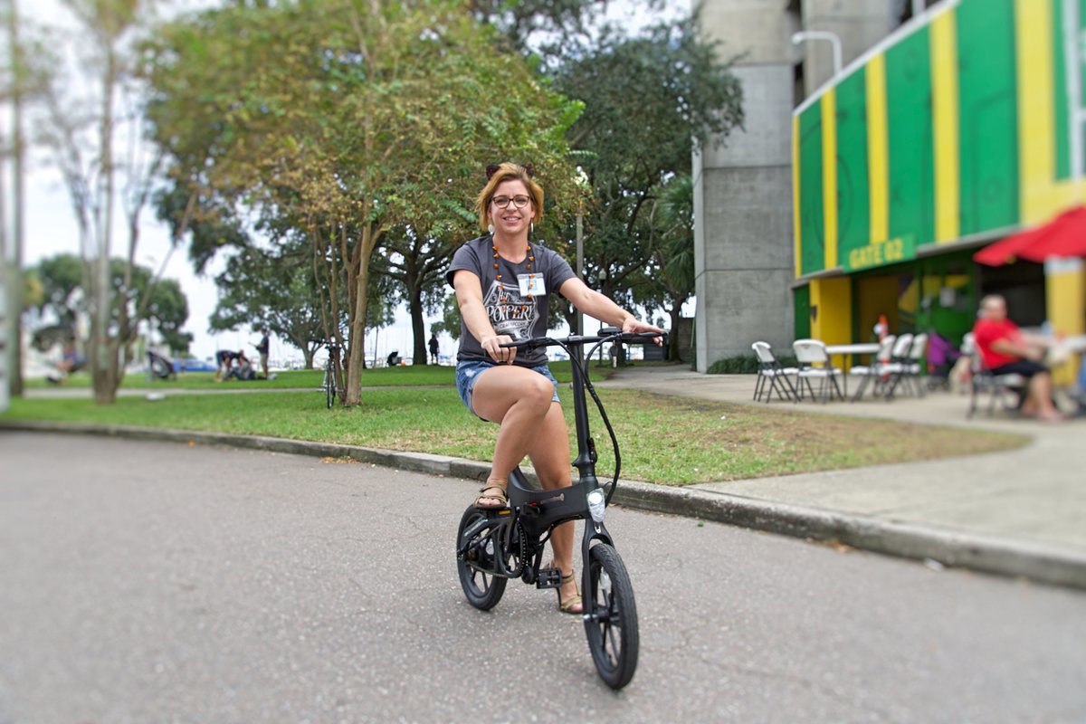 Lady riding Black Go-Bike M4