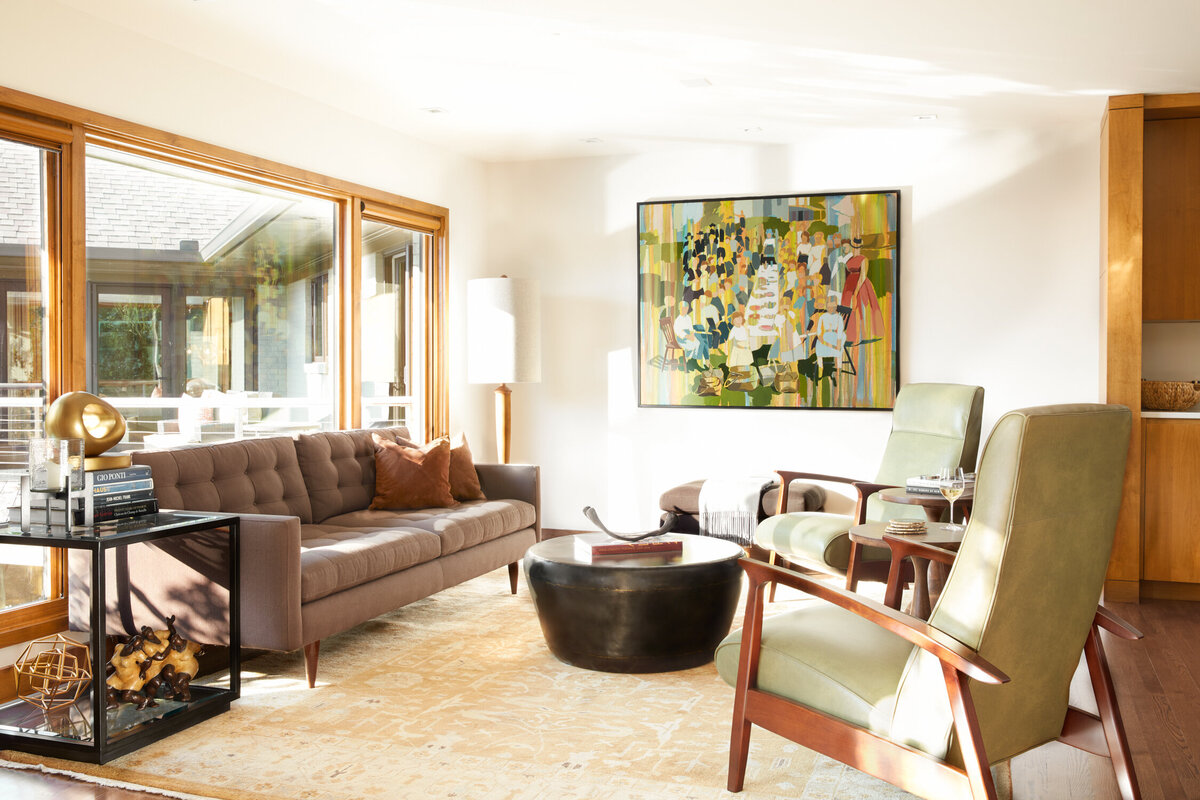 Panageries Residential Interior Design | Pacific NW Modern Dwelling Den with plenty of seating and surrounded by artwork and décor