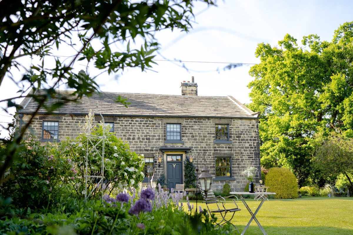 The garden and Farmhouse at Wharfedale Grange Wedding venue yorkshire