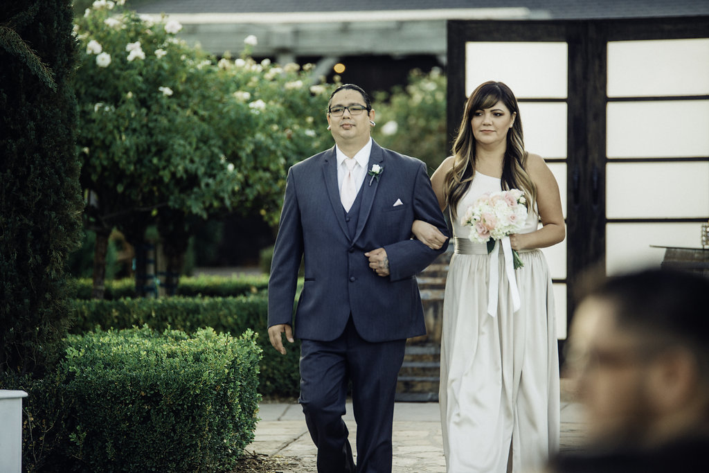Wedding Photograph Of Groomsman With Eyeglasses And Bridesmaid Los Angeles