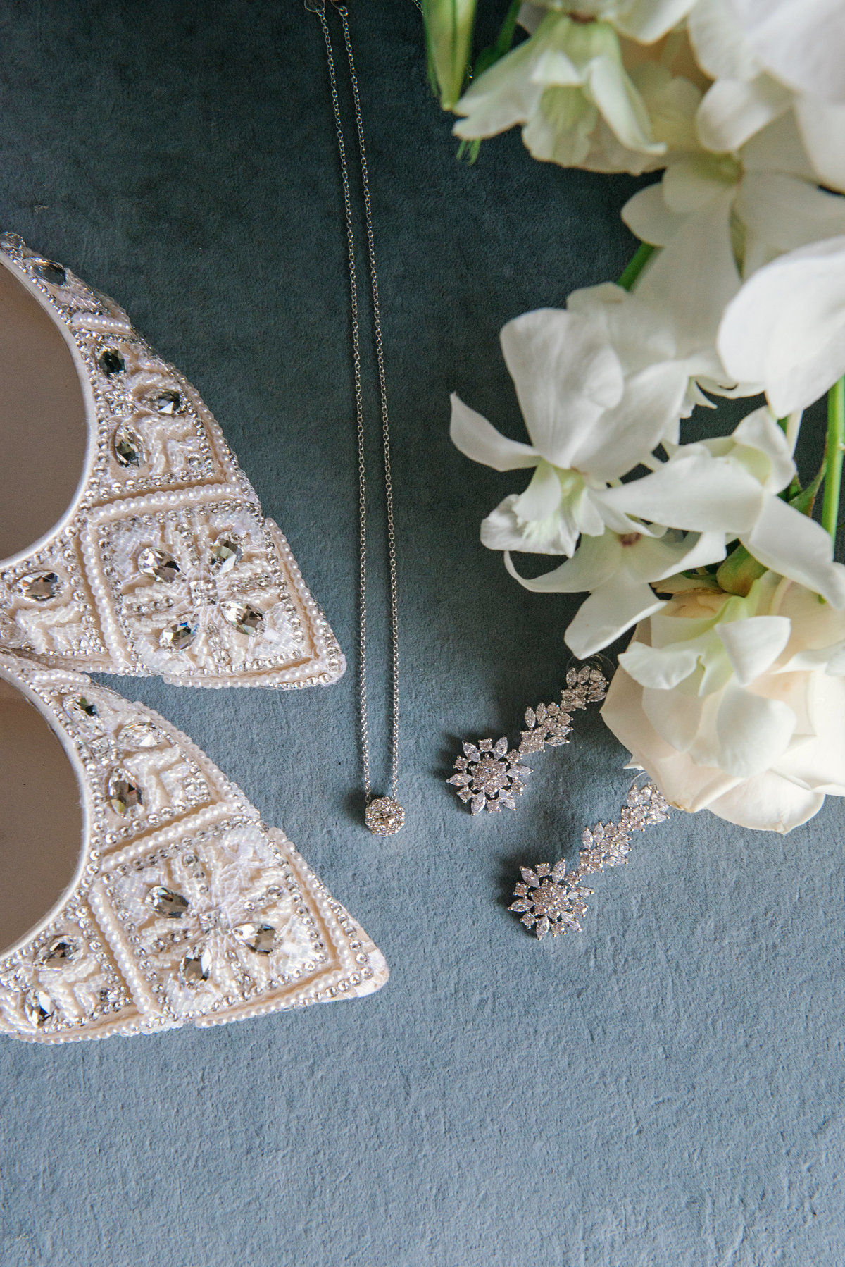 photo of bridal shoes and jewelry for wedding day at The Garden City Hotel