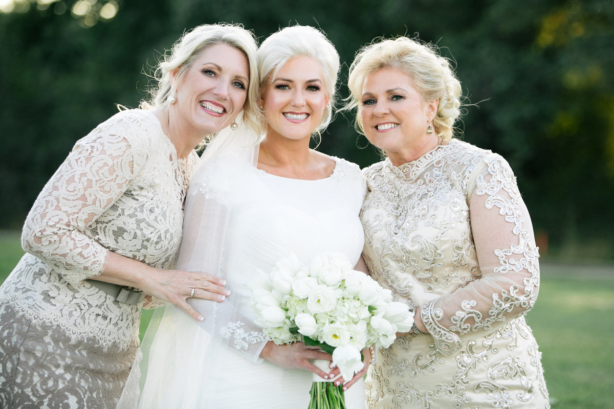 bride with mom and grandmother wedding photo