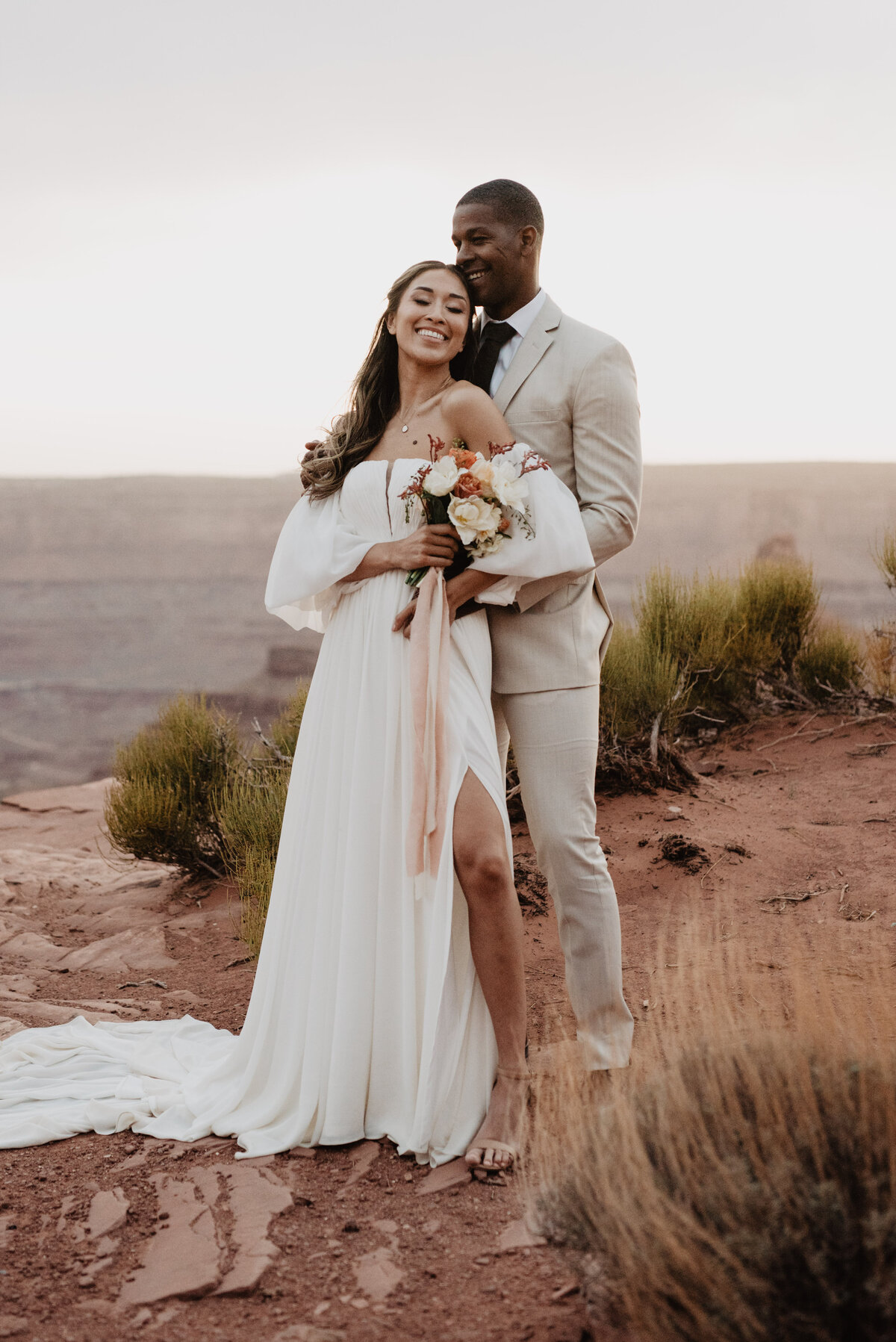 Utah Elopement Photographer captures couple embracing during bridal portraits