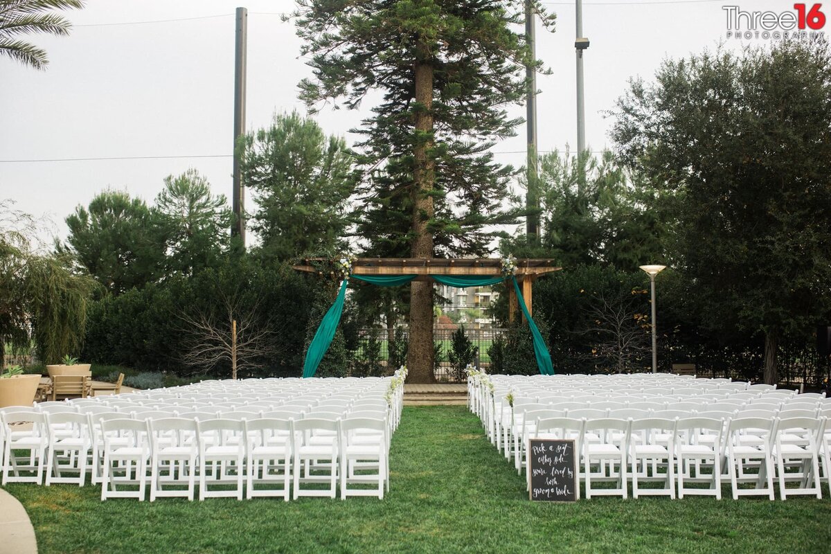 A Fullerton Community Center wedding ceremony setup for an out door wedding