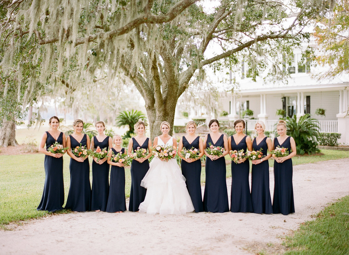 Bride and Bridesmaids in Classic Navy Blue Dresses Charleston Wedding