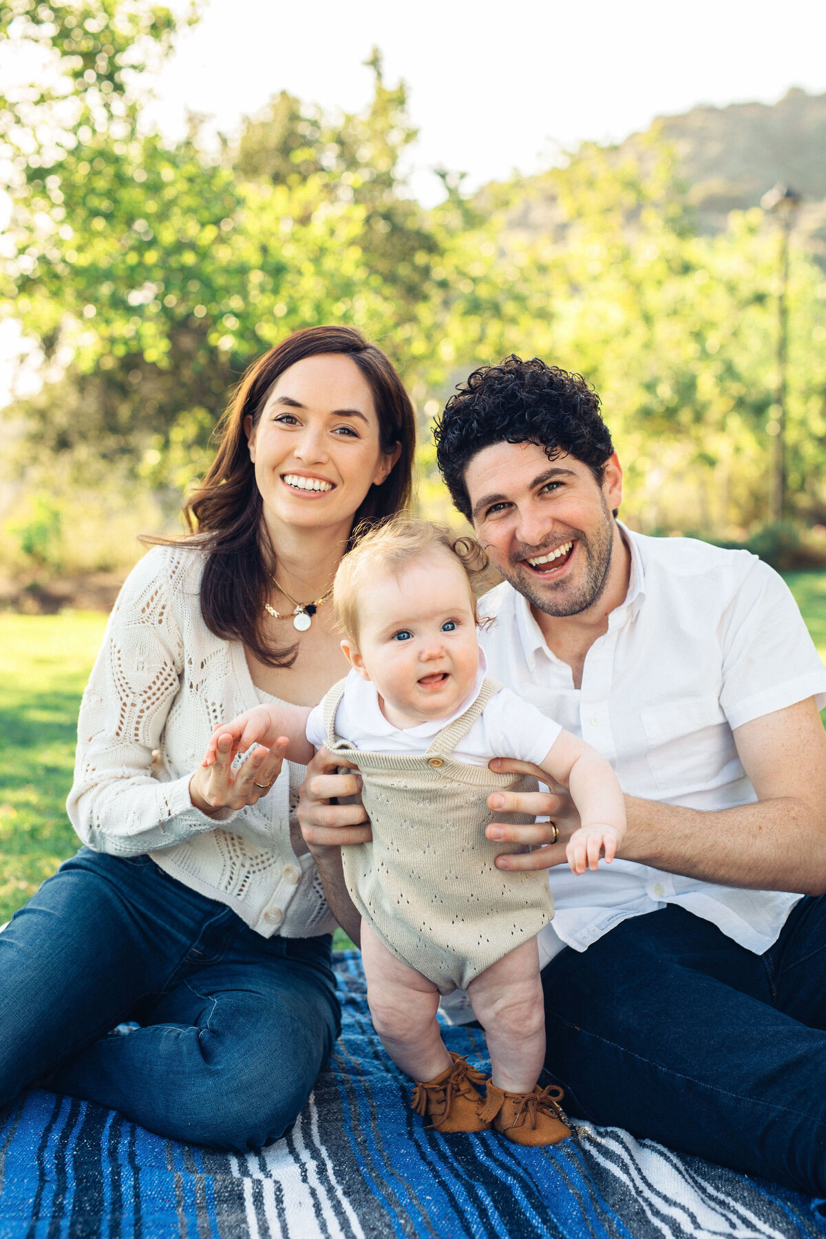 Family Portrait Photo Of Couple Assisting their baby To Stand Los Angeles