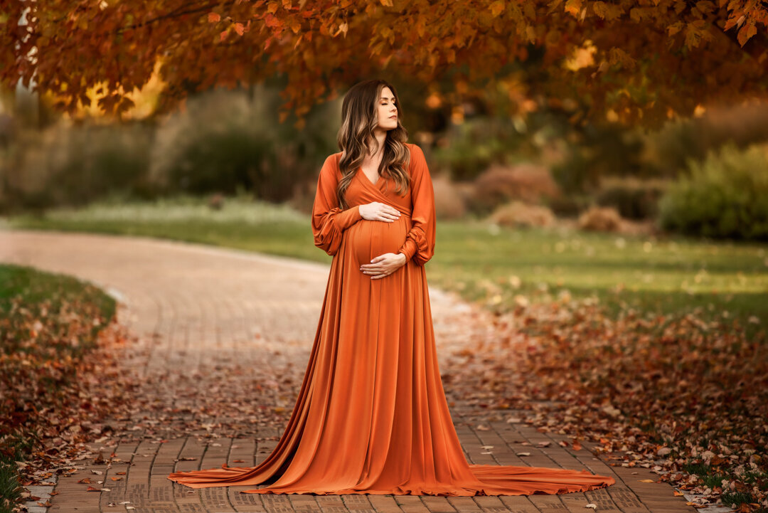Grand Rapids Maternity Photography Outdoor Session with Orange Dress By For The Love Of Photography