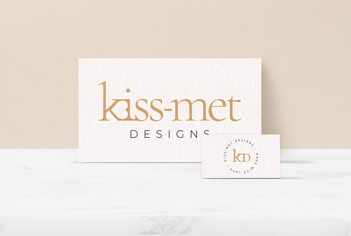 The Kiss-met logo and brand mark on two cards