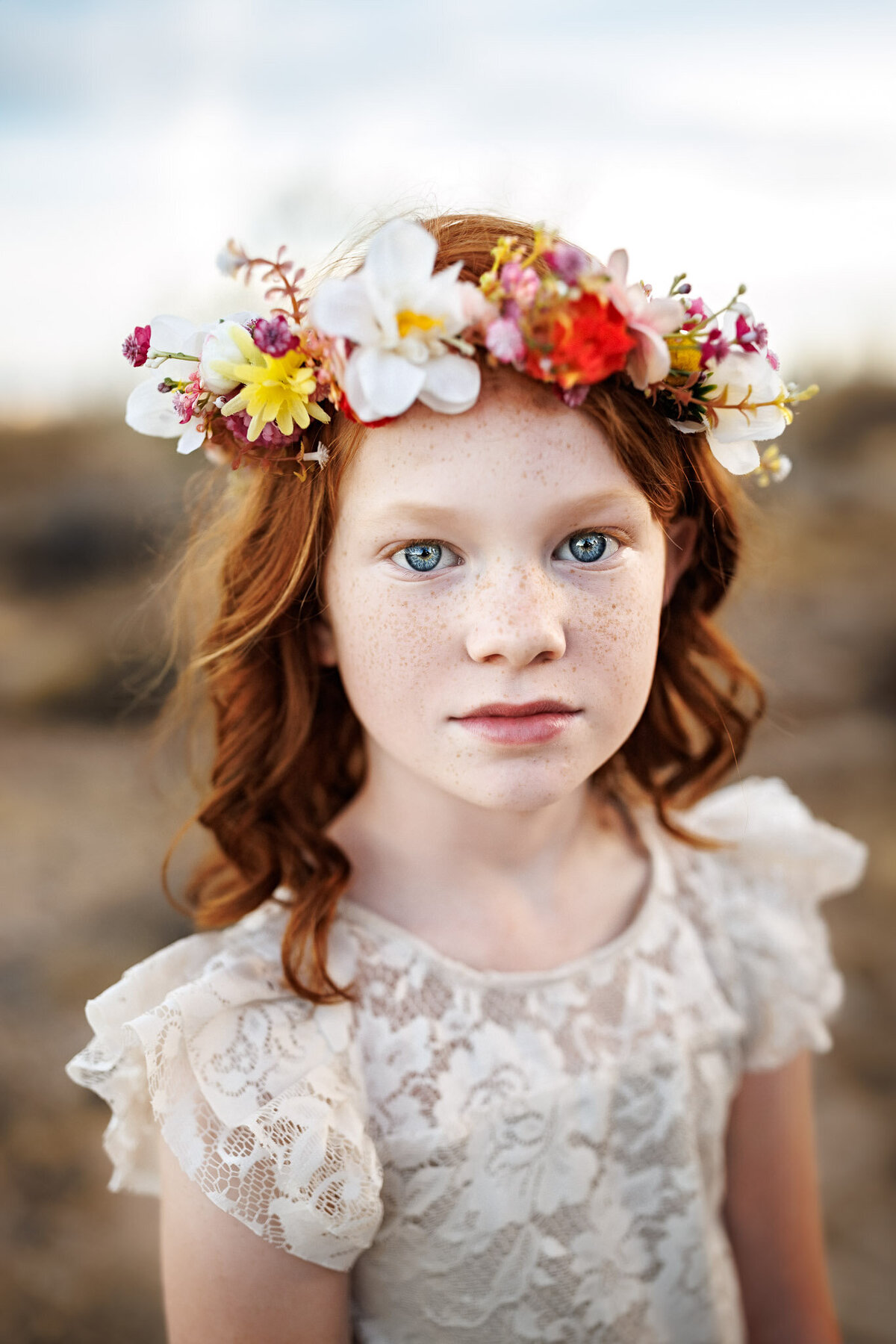 freckled red head with flower crown