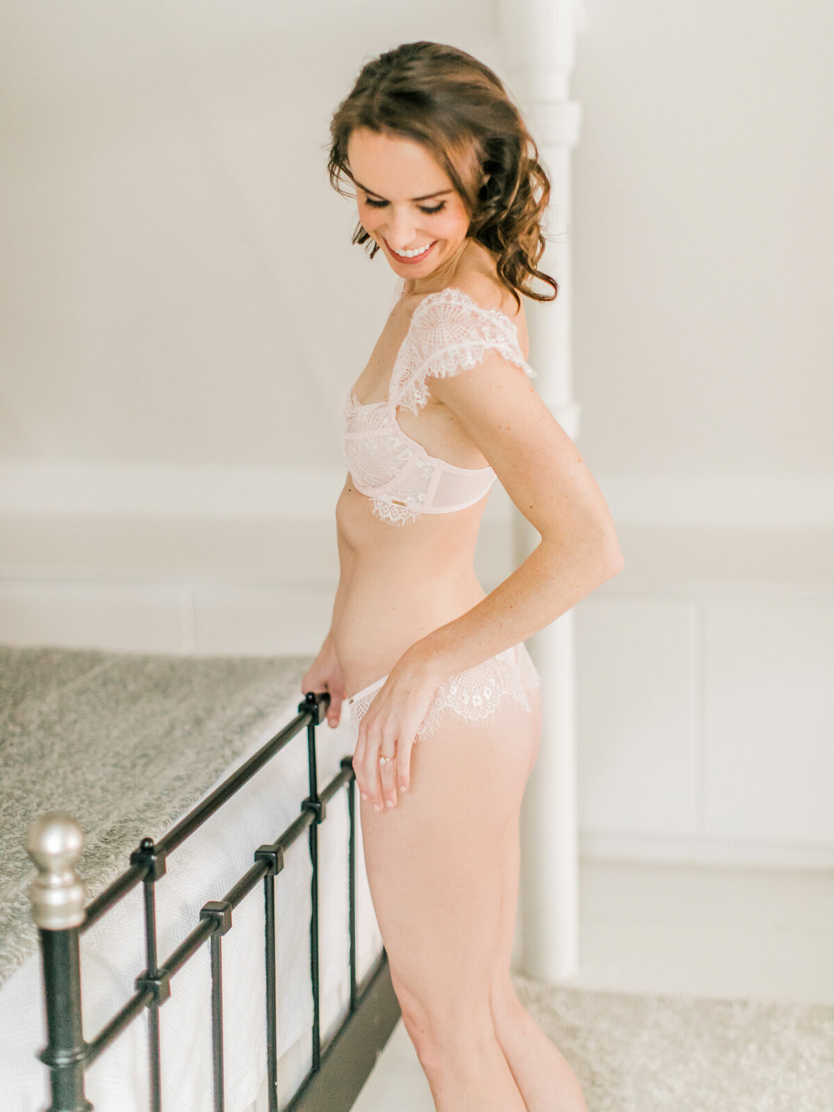 A happy candid moment during a boudoir session in Chicago
