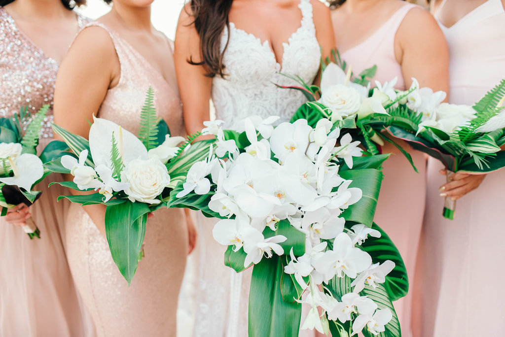 white & palm leave bouquets