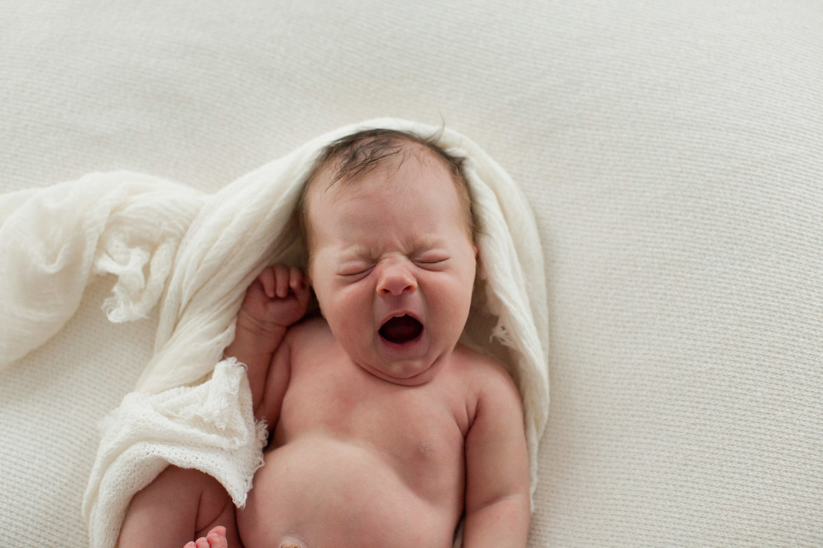 baby yawning during newborn session