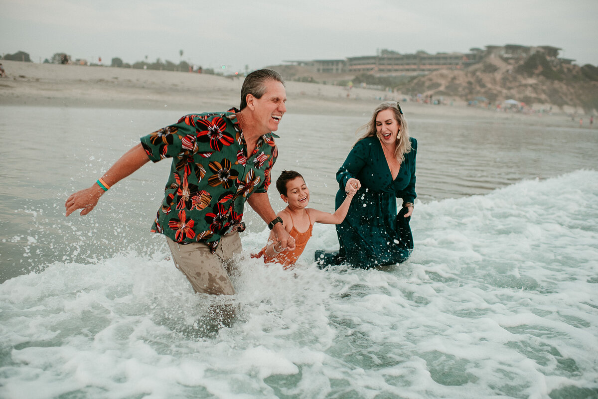 Carlsbad Family Photographer-jump the waves100