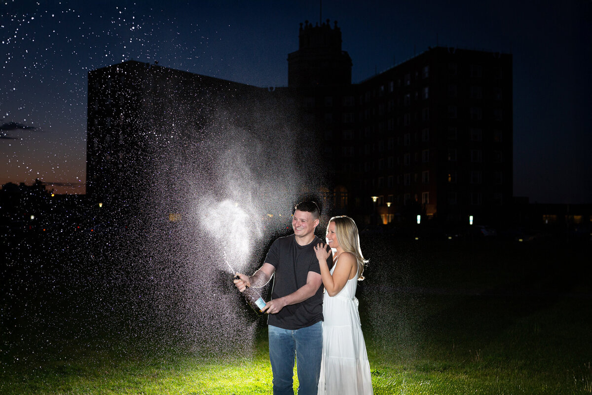 engagement-opening-champagne-bottle-night-asbury-park