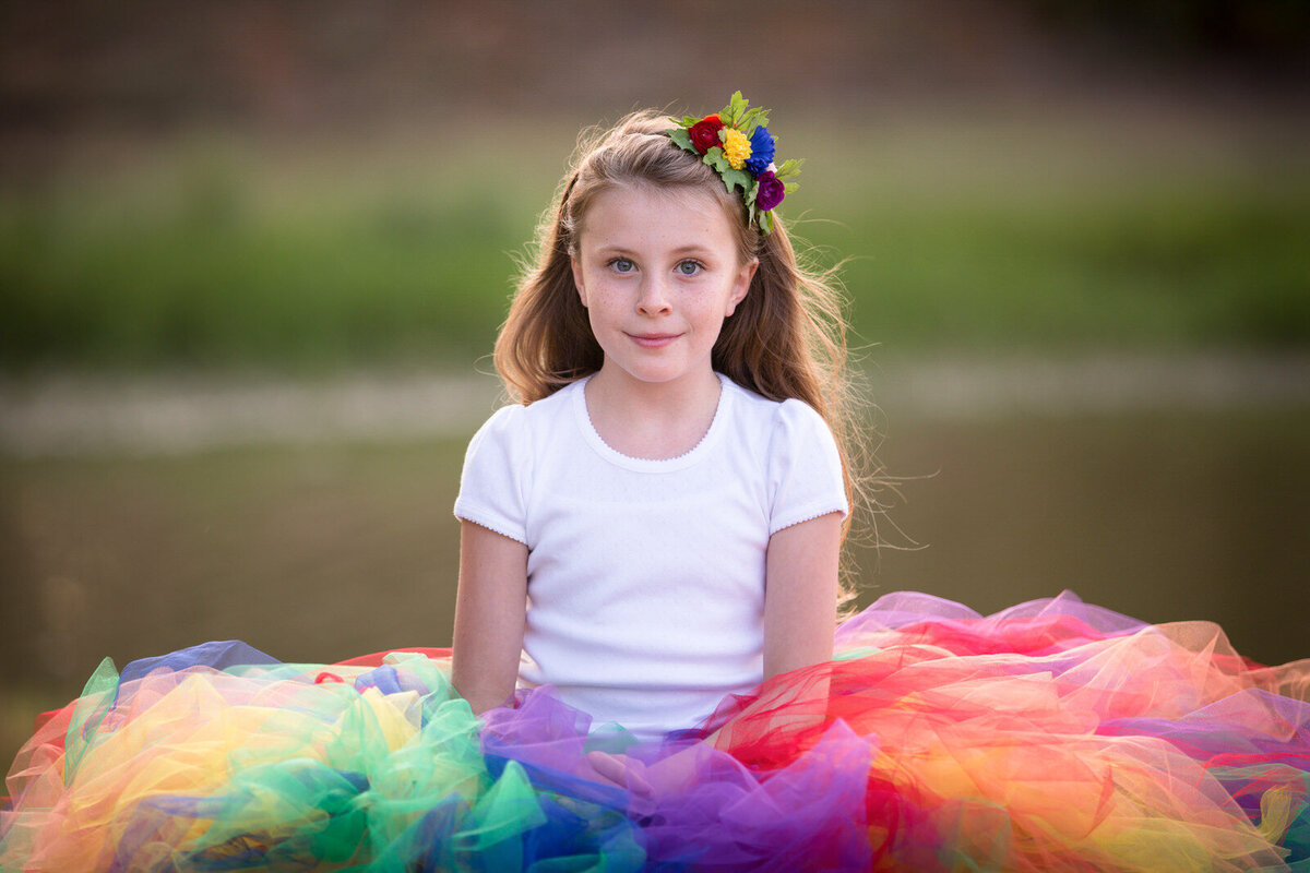 girl-in-rainbow-skirt-at-park-in-arlington