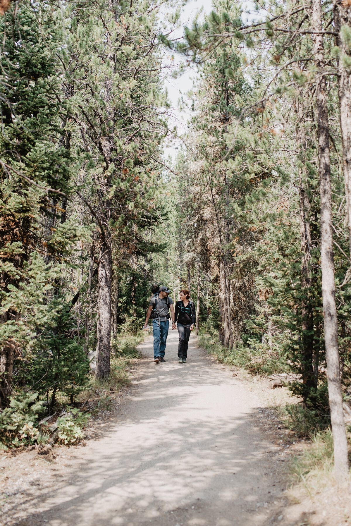 Jackson Hole photographers capture man and woman walking together