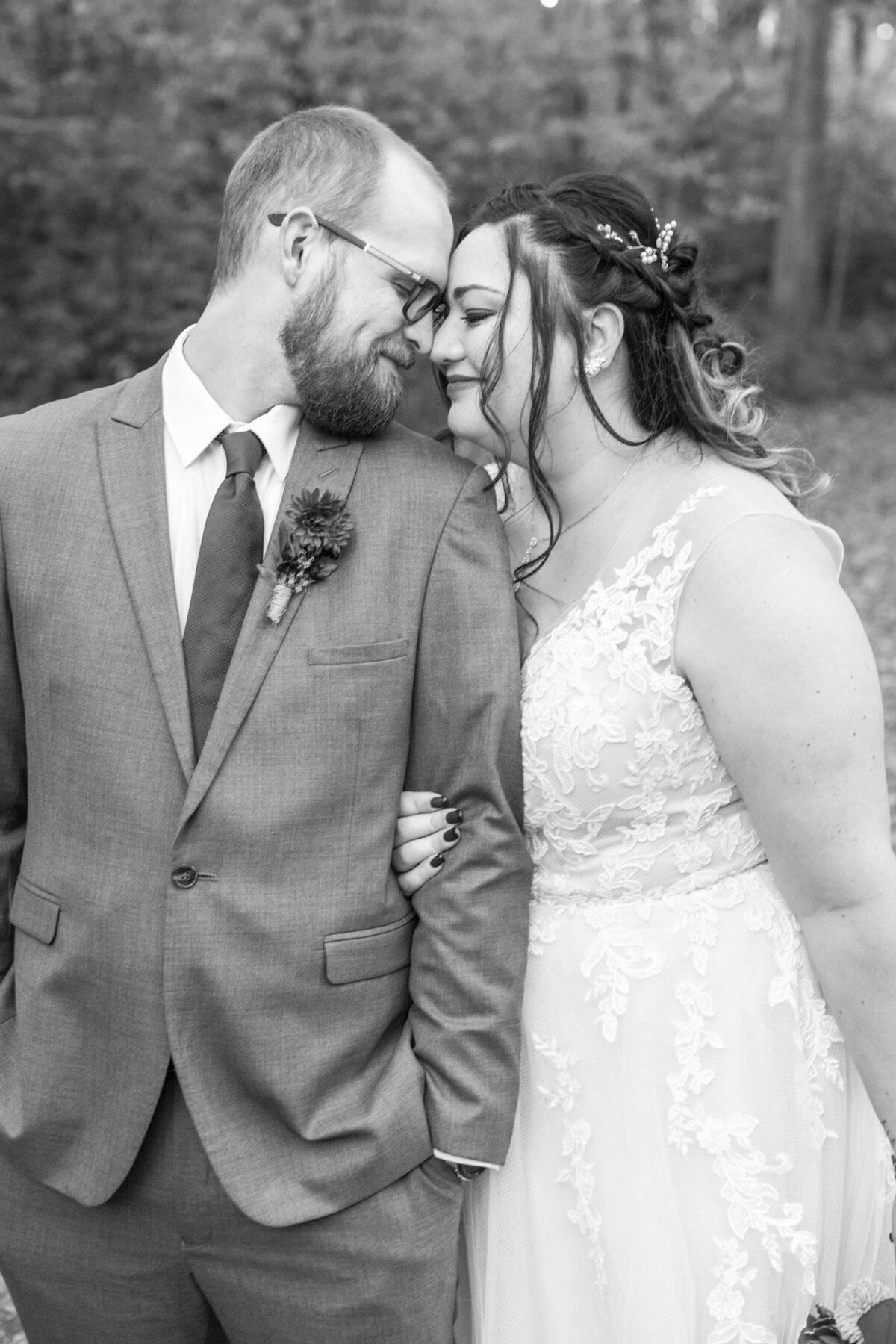 Wedding couple photos touching foreheads Asheville NC Botanical Gardens at Asheville