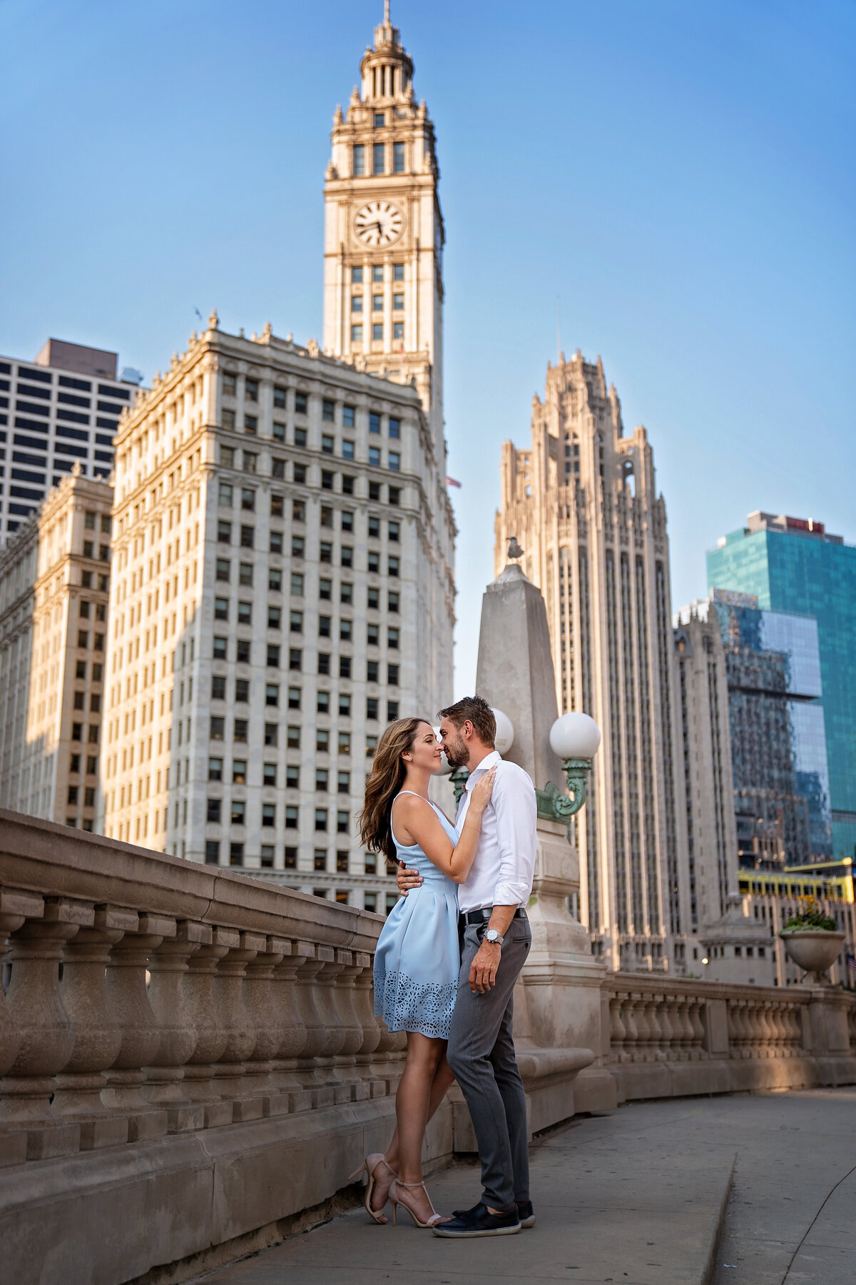 engagement pictures  near famous Wrigley building with the clock