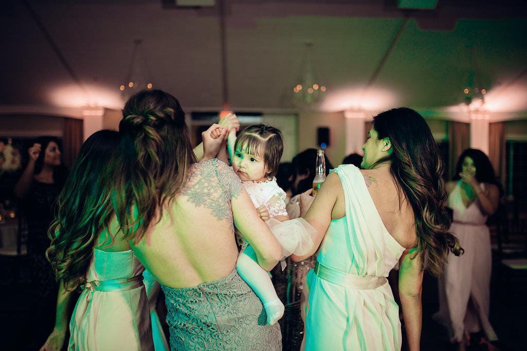 Wedding Photograph Of Women And a Toddler In The Dance Floor Los Angeles