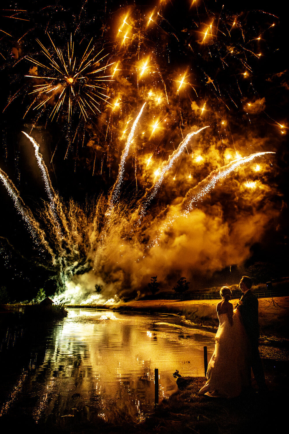 wedding couple watching fireworks