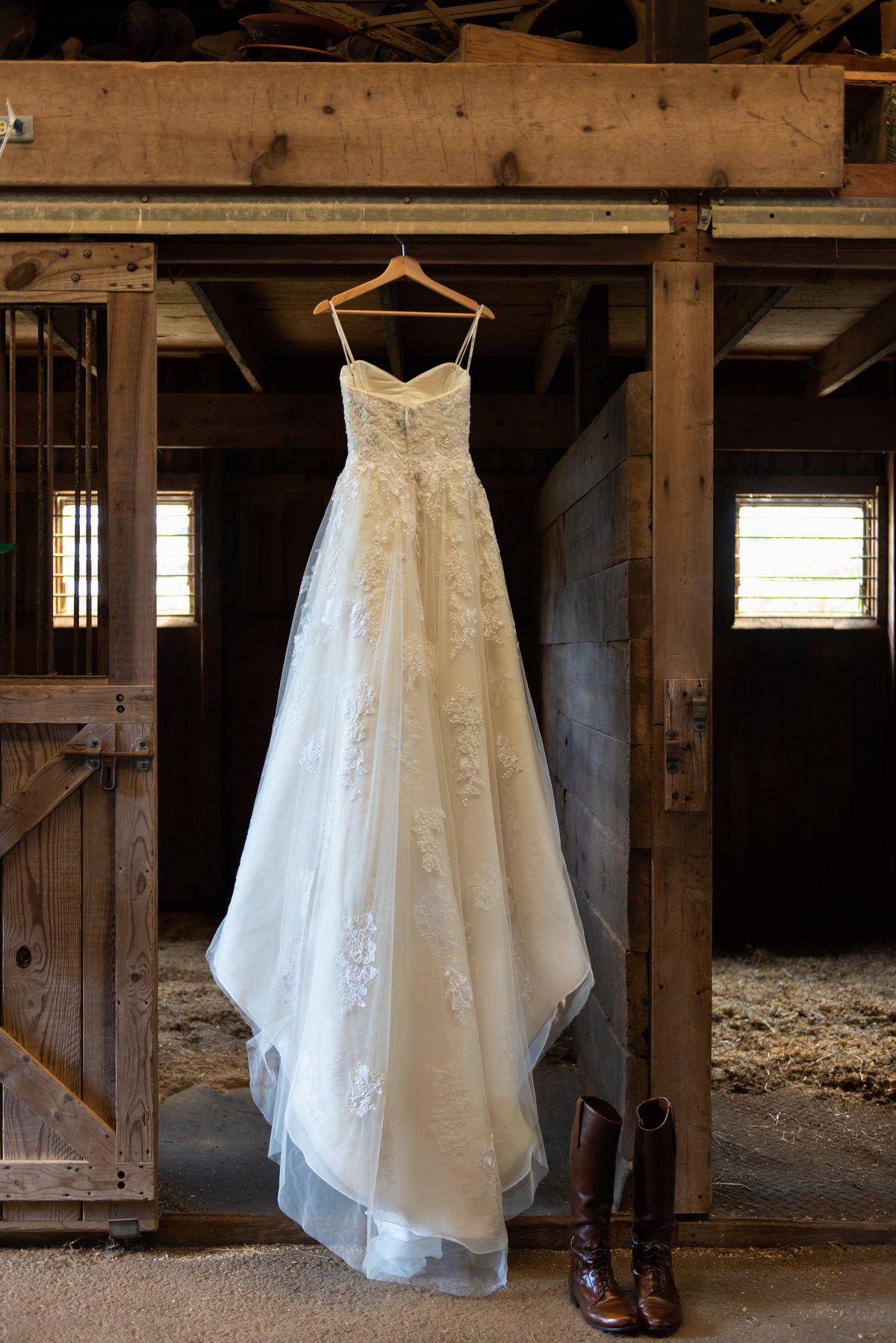 Stunning wedding gown photographed at a stall. Richmond  wedding photographers