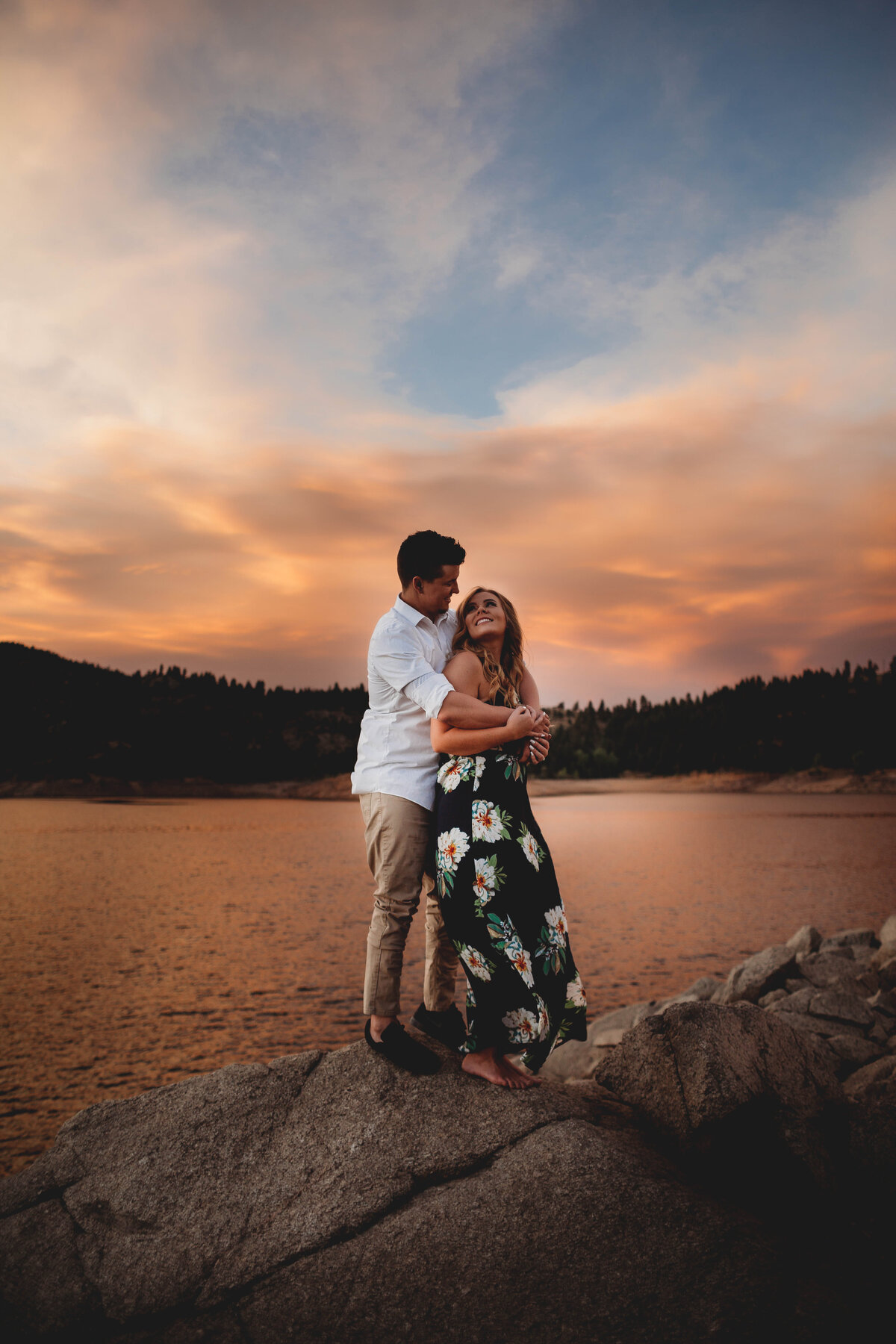 couple huges for engagement session at gross reservoir in colorado for engagement session