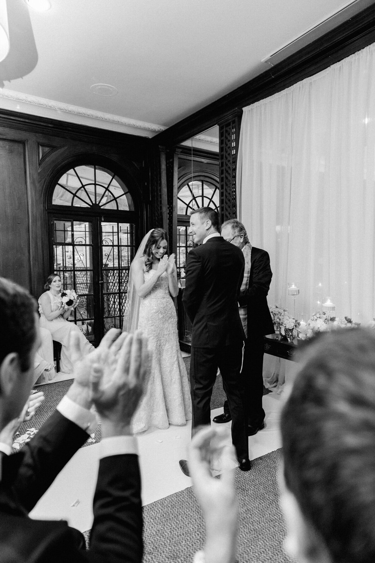 A candid wedding ceremony moment captured at Salvatore's in Chicago
