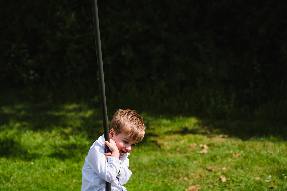 Little boy on zip line during family photoshoot in rutland