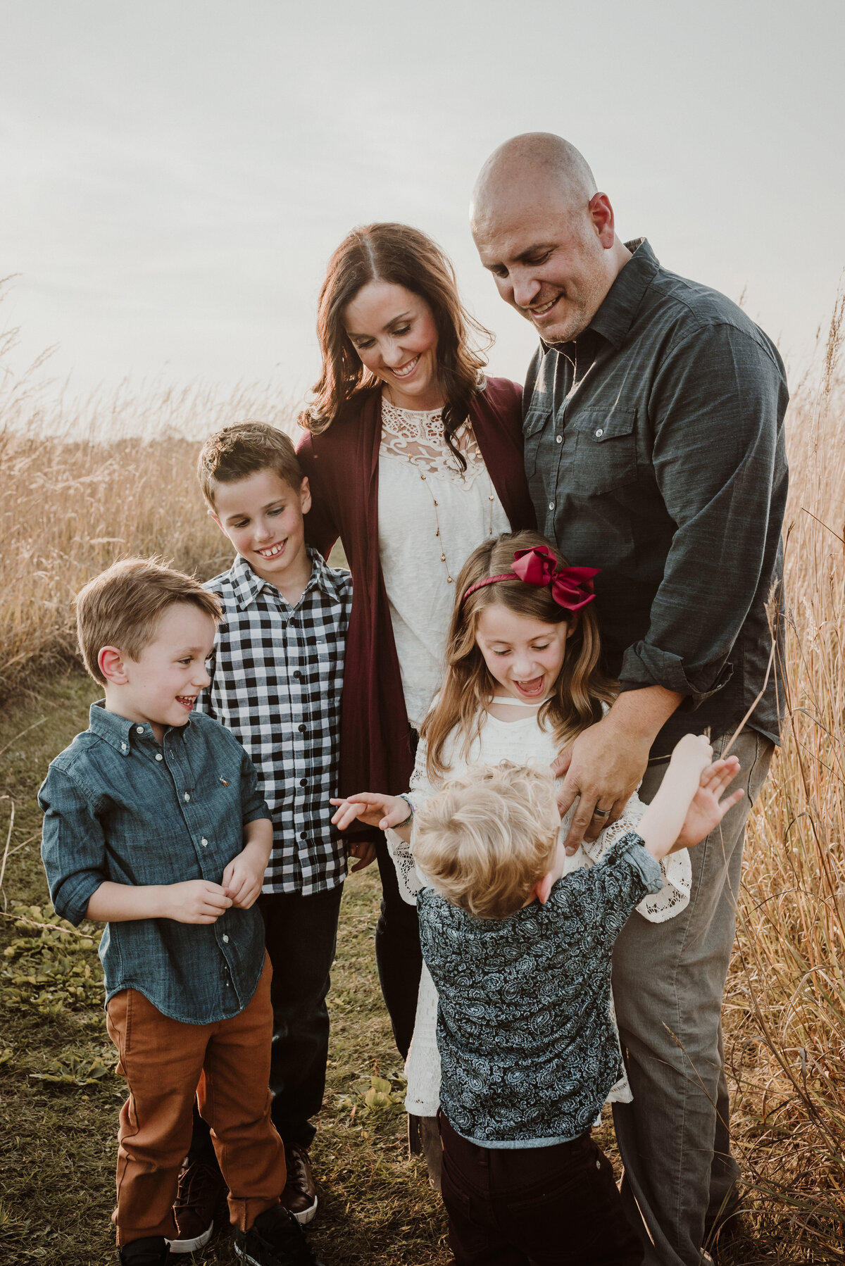 Experience sunlit joy in St. Paul family portraits by Shannon Kathleen Photography. Let every smile and laugh be a testament to your family's happiness. Book now!