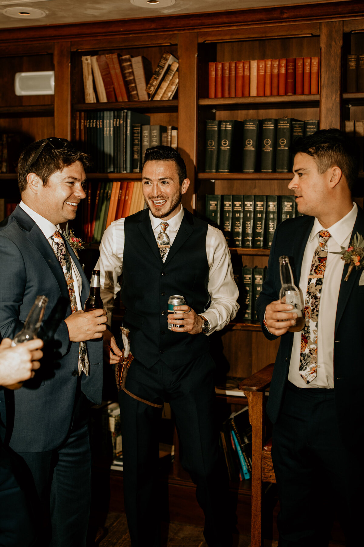 groom having a drink with buddies before wedding ceremony