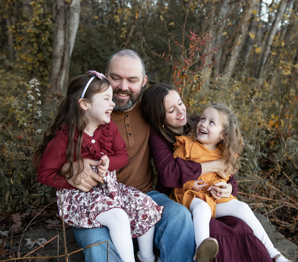 Ingrid Berrios, a Harford County photographer, took the picture of this family looking at eachother and laughing during their fall lifestyle family photos.