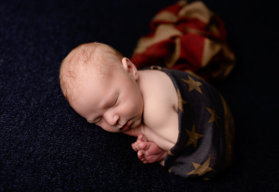 Newborn Baby wrapped in flag By For The Love of Photography.jpg