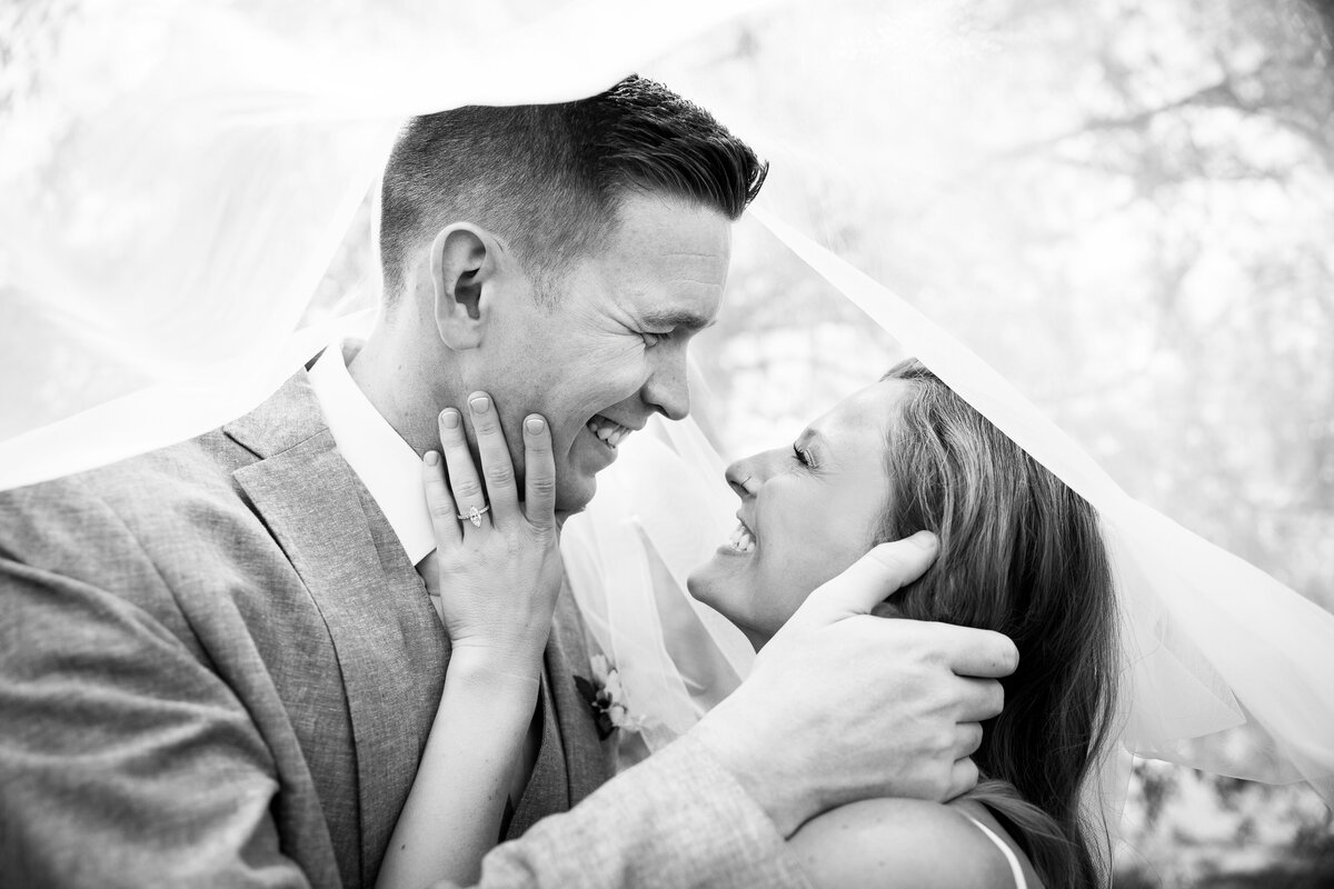 bride-groom-under-veil-black-and-white-NJ