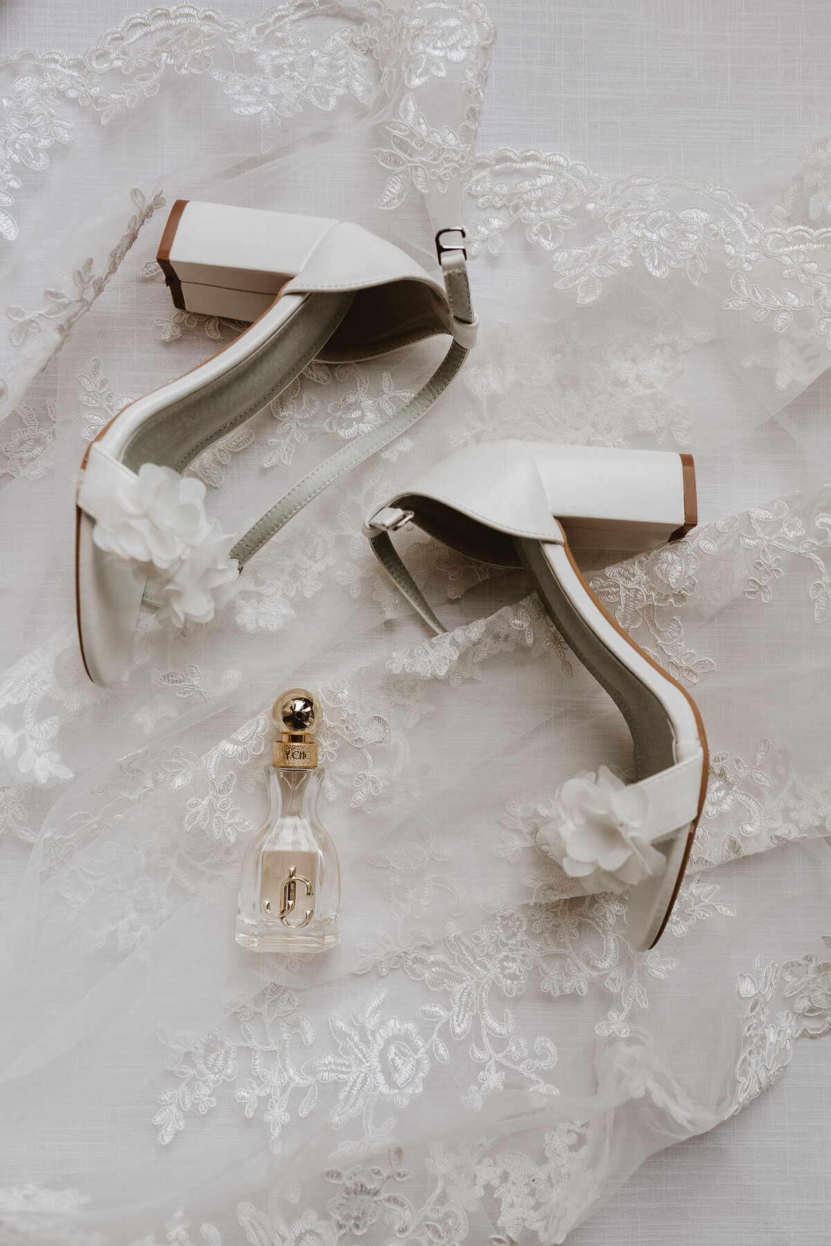brides shoes, perfume and vail display