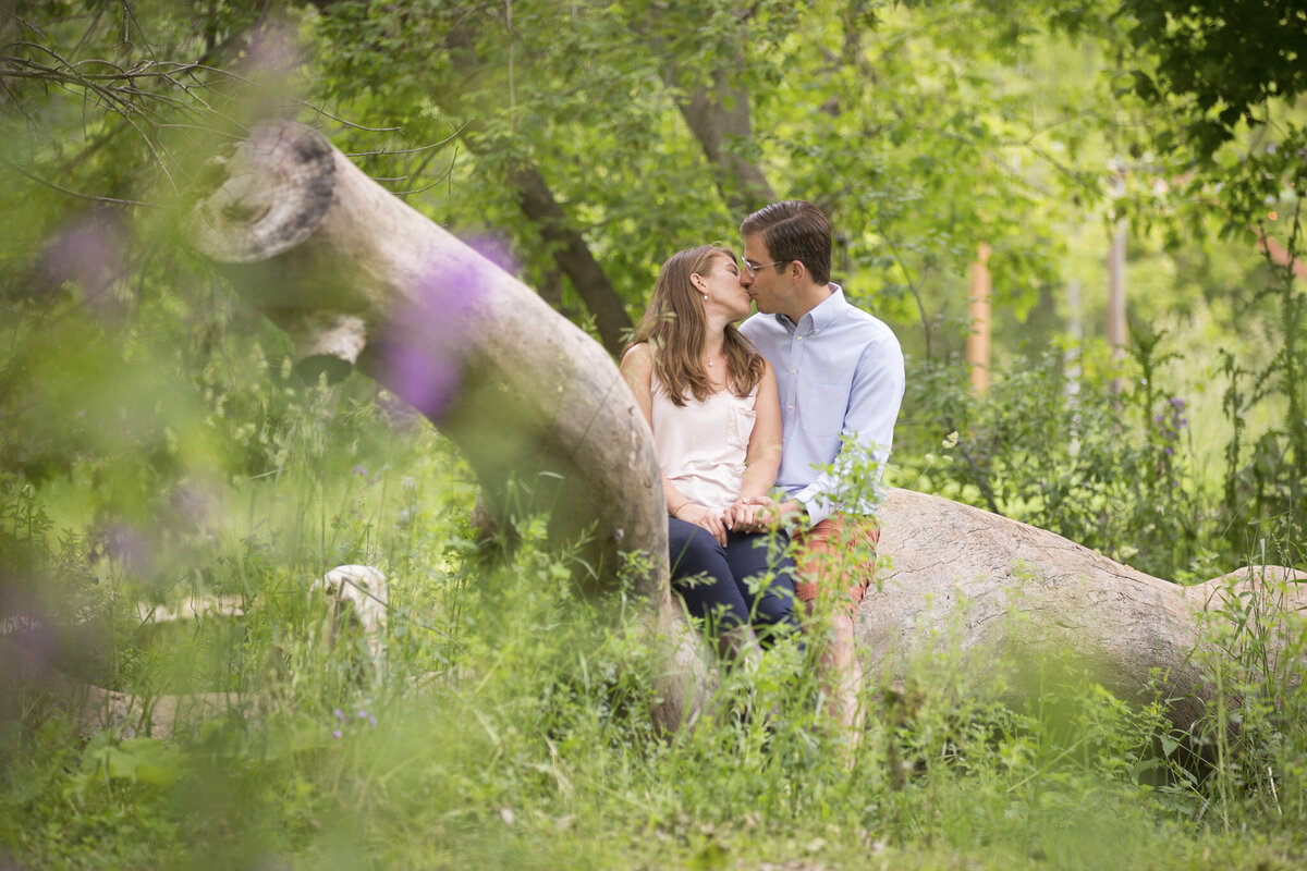 couple kissing in a garden