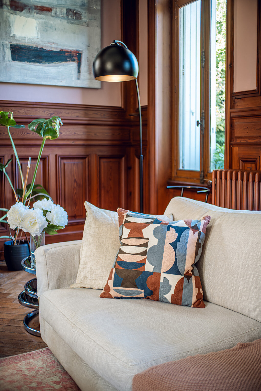 Close-up of cushions in the grand salon at Chateau Charente, showcasing refined textures and comfort.