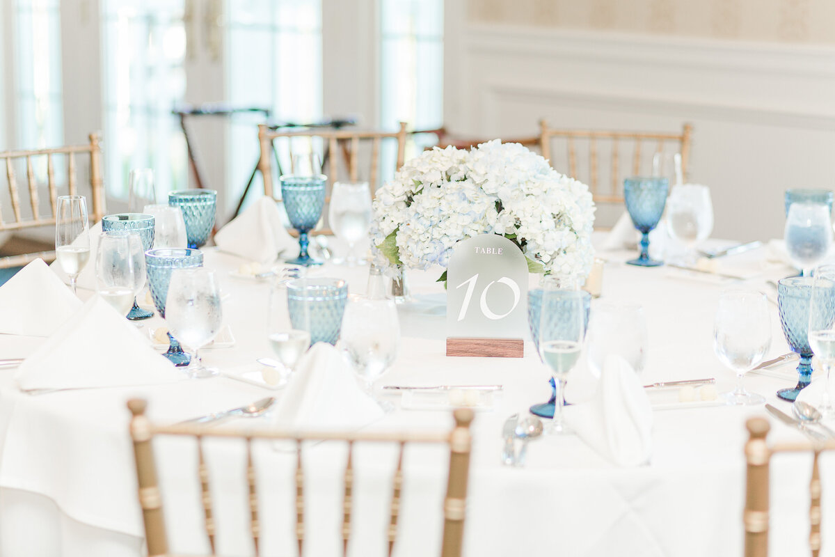 Detail image of place settings at a Madison Beach Hotel wedding reception. Captured by best New England wedding photographer Lia Rose Weddings.