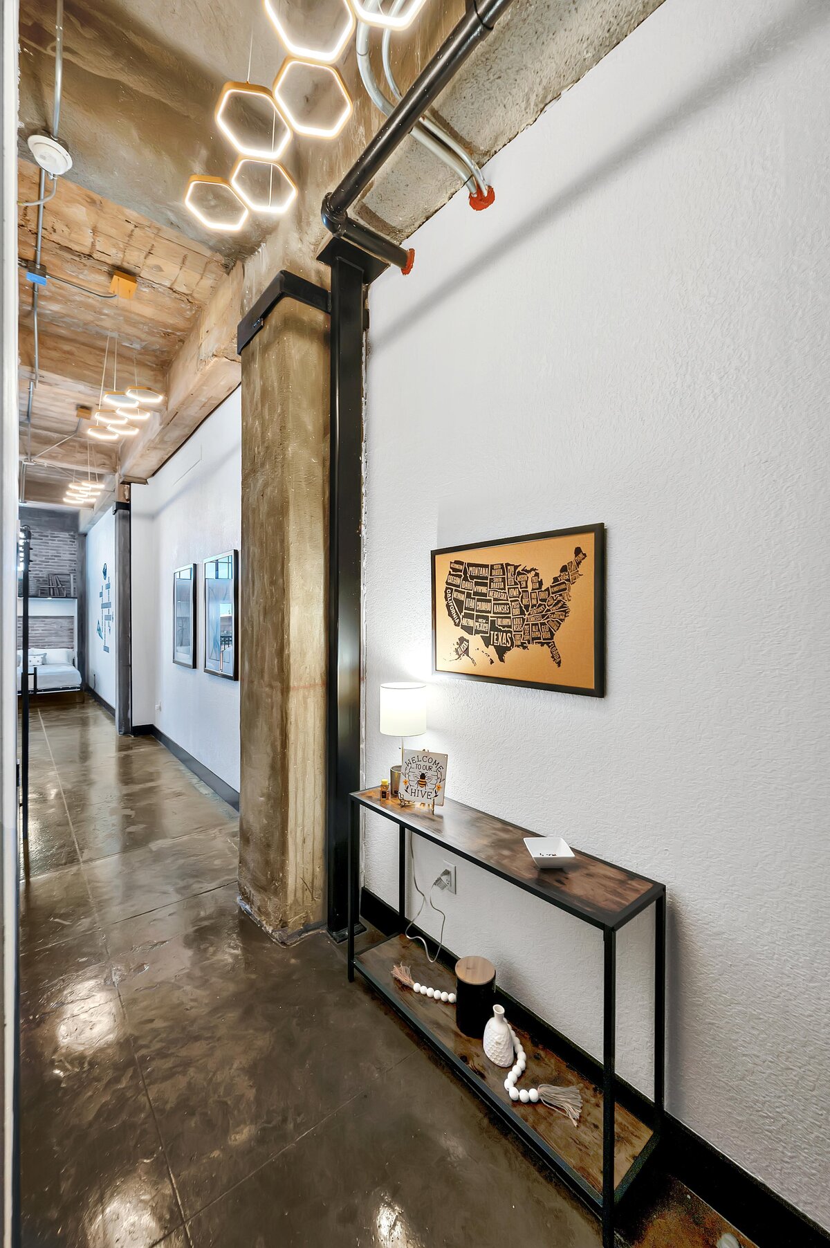 Stunning entrance to this one-bedroom, one-bathroom vintage condo that sleeps 4 in the historic Behrens building in the heart of the Magnolia Silo District in downtown Waco, TX.