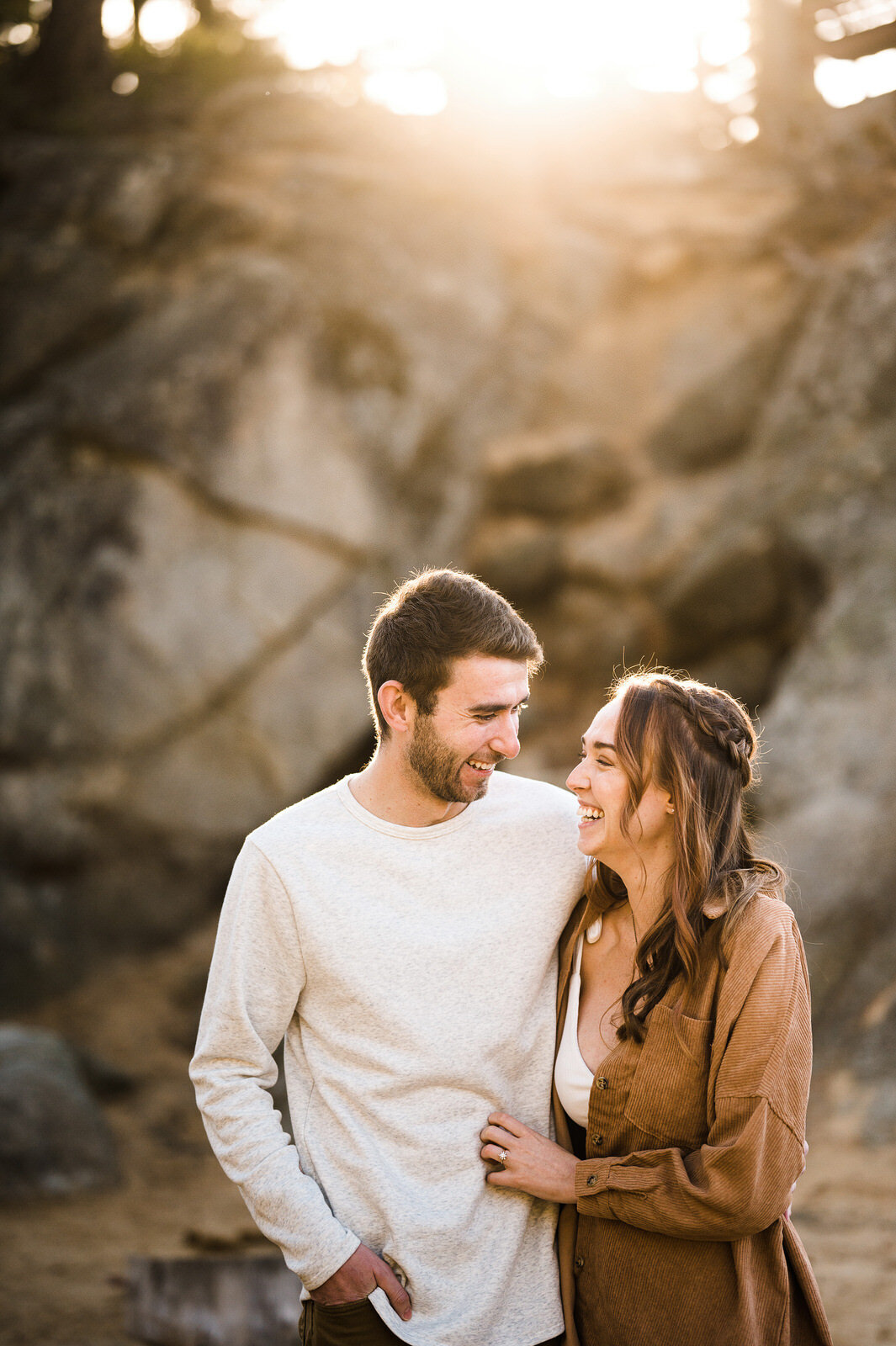 Couple embracing in Tahoe's golden light
